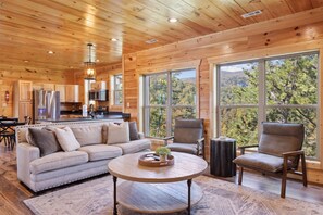 Challenge friends to a game of air hockey, take a dip in the heated pool, soak in the hot tub | Woodland Cove in Sevierville, TN