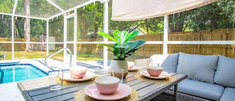 Outdoor dining area overlooking the heated pool!