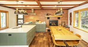 chef's kitchen with fireplace