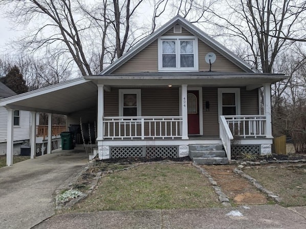 Front of house and carport.
