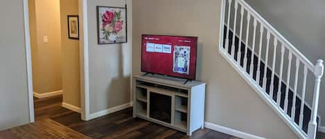 Living room with smart tv. Netflix is provided. 