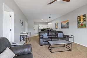 Open layout from living to kitchen area featuring great design & decor throughout, plus a small workstation to bring those last projects with you and enjoy lake time!