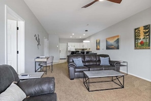 Open layout from living to kitchen area featuring great design & decor throughout, plus a small workstation to bring those last projects with you and enjoy lake time!