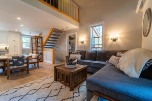 Family room, dining area and peek at the laundry room/mini-office.