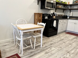 Dining table seats four people.