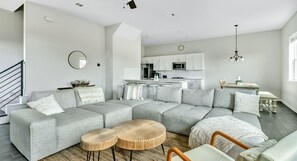 Living room over looking dining and kitchen area