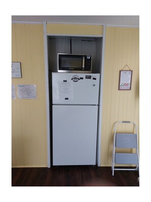 Of course what kitchen is complete without a Microwave and fridge.