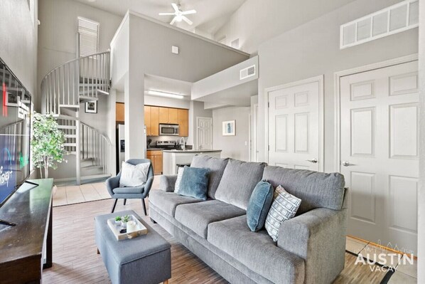 Living room with sleeper sofa and smart TV