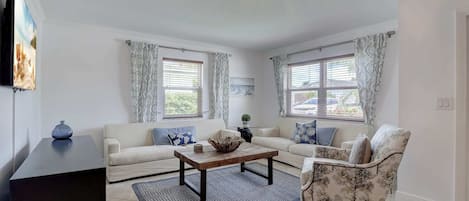 There Is Great Natural Light in the Family Room With Large Windows