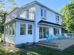 Spacious back deck to relax and take in the views.