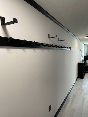 Plenty of room for coats, racks for two snowboards and two sets of skis.