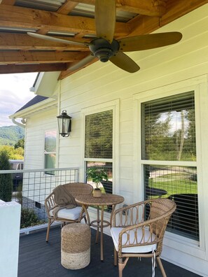 Front porch. Hear the church bells chime and river while having a morning coffee