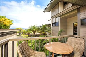 Private balcony overlooking lush tropical landscaping KRV-724