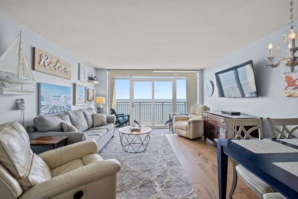 This oceanfront living room is perfect for movie night.