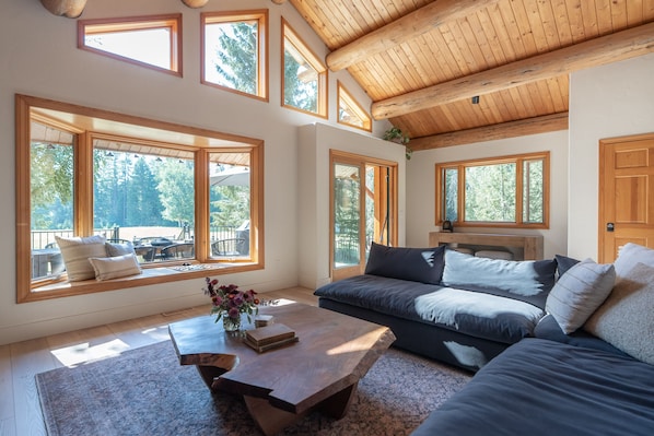 Open concept, spacious living room with tons of natural light and great views