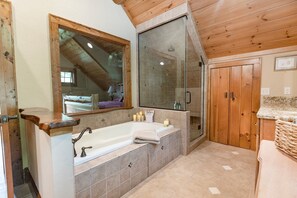 Primary en suite bath with jacuzzi tub