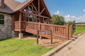 The rustic cabin look and feel welcomes you as you drive up, as well as a ramp for wheelchair accessibility!  We have also recently added a concrete ramp over the curb too!