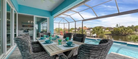 Perfect outdoor space overlooking the pool and canal.