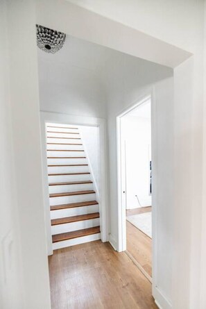 Your private entrance leads you into the foyer. To the left you will find the Parsonage main floor bedroom and attached bathroom. To the left, a divider door will be unlocked to provide easy access to the Main Street Suite.