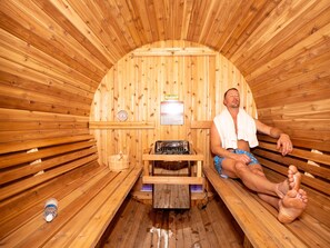Unwind in the outdoor barrel sauna, where the soothing warmth meets breathtaking views - your perfect retreat after a day of adventure.