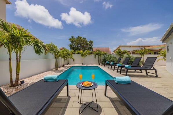 Enjoy a nap by the pool, or just grab a refreshing drink and socialize with your friends.