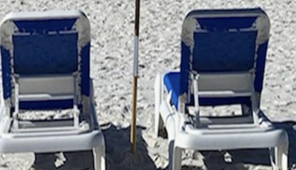 INCLUDED: Oceanside beach chair service