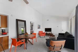 Light & Bright Living area on the upper level with high vaulted ceilings.