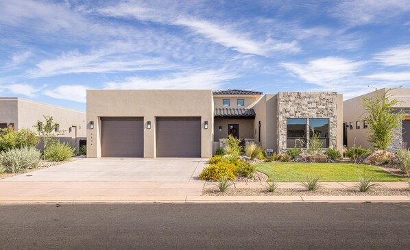 Front View - Sunny Daze is a beautiful 2,490 square foot, 3-bedroom, 3.5-bathroom luxury home located at The Ledges of St. George.