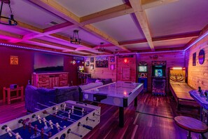 Fun for the entire bunch! The ultimate game room featuring 6 arcades, foosball, air hockey and much more!