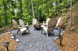 Roast a marshmallow and enjoy nature in this cozy Firepit area.