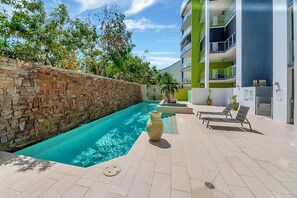 elax and rejuvenate in the shared pool area, featuring a sparkling swimming pool and a soothing spa. Whether you're taking a refreshing dip or unwinding in the spa, this peaceful outdoor space offers the perfect place to relax and enjoy the sunshine.