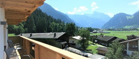 Sky, Property, Building, Cloud, Mountain, Wood, Tree, Shade, Plant, Roof