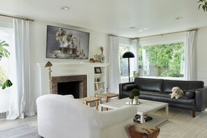 This sun-soaked living room will be a haven for you and your loved ones.