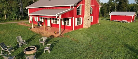 Beautiful Farmhouse with outdoor and indoor fireplaces. Enjoy the amazing rural setting of Pine Haven Farms. Roast marshmallows around a campfire, enjoy a cool breeze on the porch or take advantage of the massive indoor space to enjoy time with family and friends.