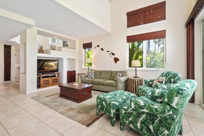Living area with high ceilings