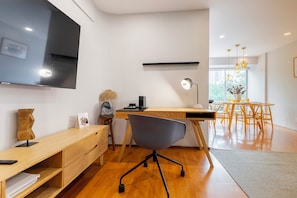 Work comfortably with a dedicated desk and chair.