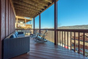 The porch is big enough to stretch out and relax!