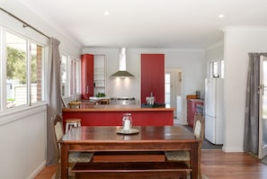 Full kitchen and dining area