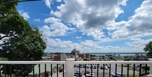 Balcony to enjoy coffee and watch the bustling little city and lake