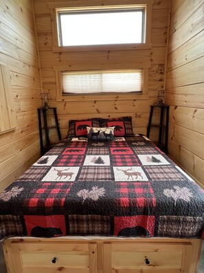Queen bed in main bedroom.