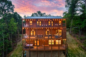 Each level: top deck, views; middle deck, fireplace, eating area; lower, hot tub
