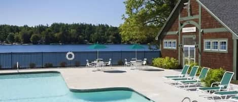 Heated pool next to gym, both overlooking the water.