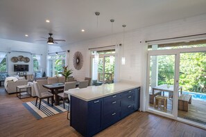 The main floor brings the kitchen, dining area and living room together. 