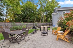 Outdoor fire pit and seating.  The water is just a stones throw away!