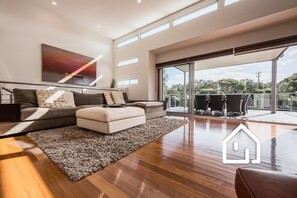 Comfortable lounge in the light filled main open plan living area  