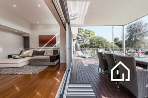 Stacker doors promote seamless indoor/outdoor integration