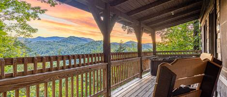 Enjoy stunning views of the Smoky Mountains from the bank porch.