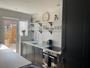 Fully fitted kitchen with integrated appliances