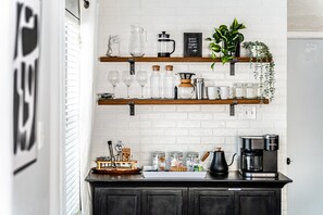 Fully stocked coffee bar with coffee at least 3 ways