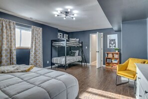 Large bedroom with King bed and twin bunk beds with plenty of space!